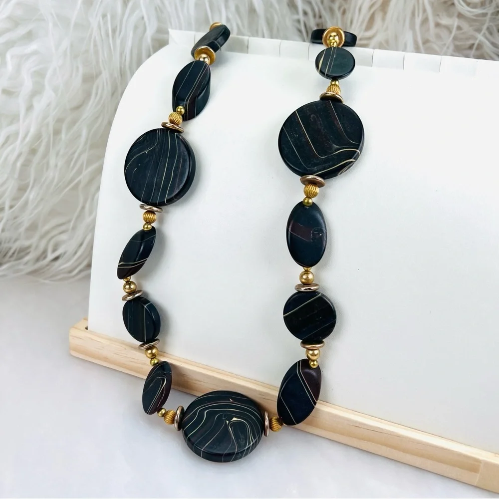 Pretty black swirl, and goldtone costume necklace